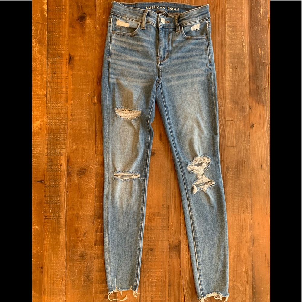 AMERICAN EAGLE Hi-Rise Jegging, Next Level Stretch temp tech Size 0 Regular